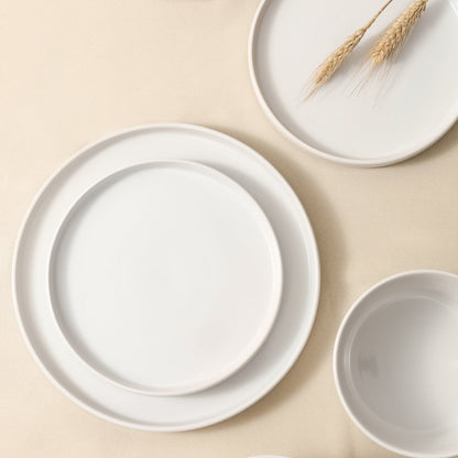 Transform Your Dining Moments with the Celina 16-Piece Mid-Century Modern Dinnerware Set in Chic White Stoneware