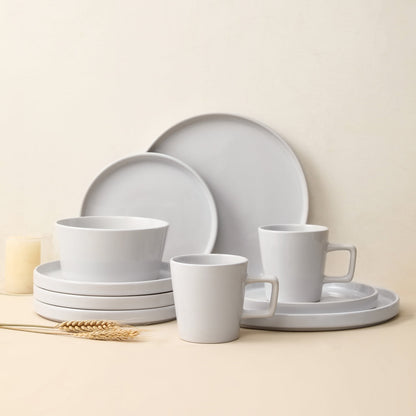 Transform Your Dining Moments with the Celina 16-Piece Mid-Century Modern Dinnerware Set in Chic White Stoneware