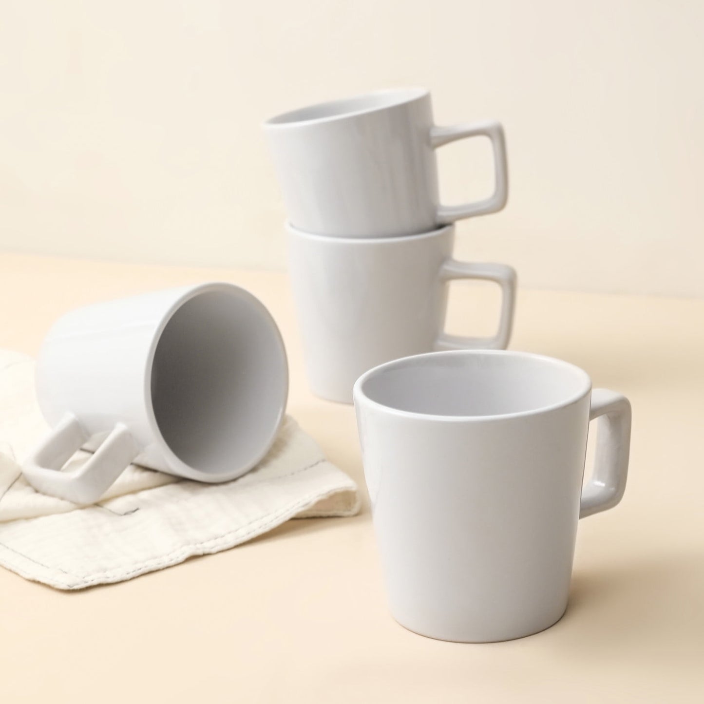 Transform Your Dining Moments with the Celina 16-Piece Mid-Century Modern Dinnerware Set in Chic White Stoneware