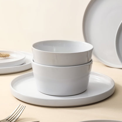 Transform Your Dining Moments with the Celina 16-Piece Mid-Century Modern Dinnerware Set in Chic White Stoneware